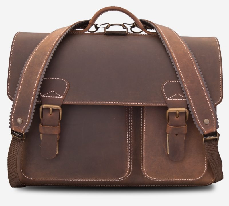 Front view of Ruitertassen brown leather satchel backpack with shoulder straps.